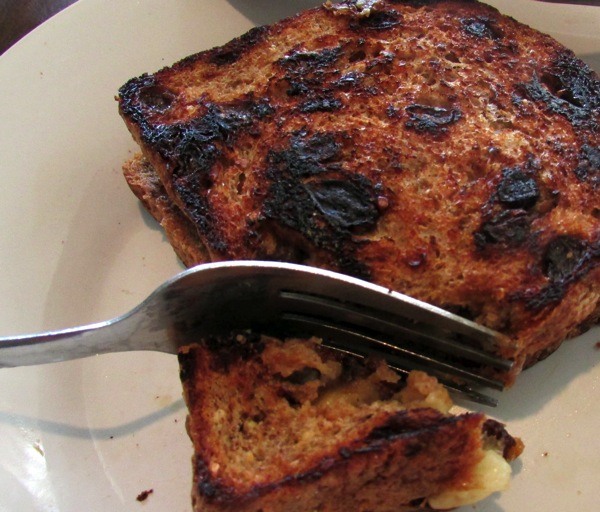 Grilled banana sandwich with fork