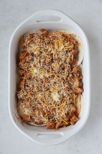 step by step layering turkey enchilada casserole