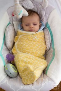 baby in swing and swaddle-1