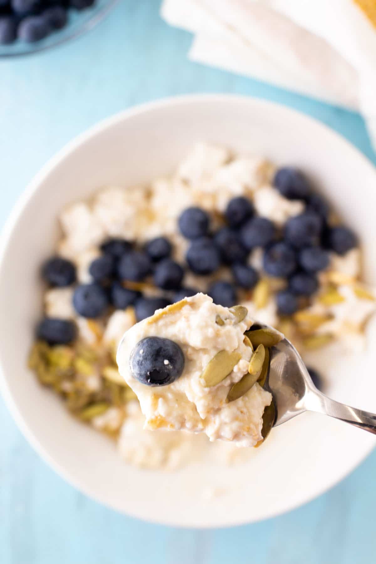 bite of blueberry cottage cheese overnight oats