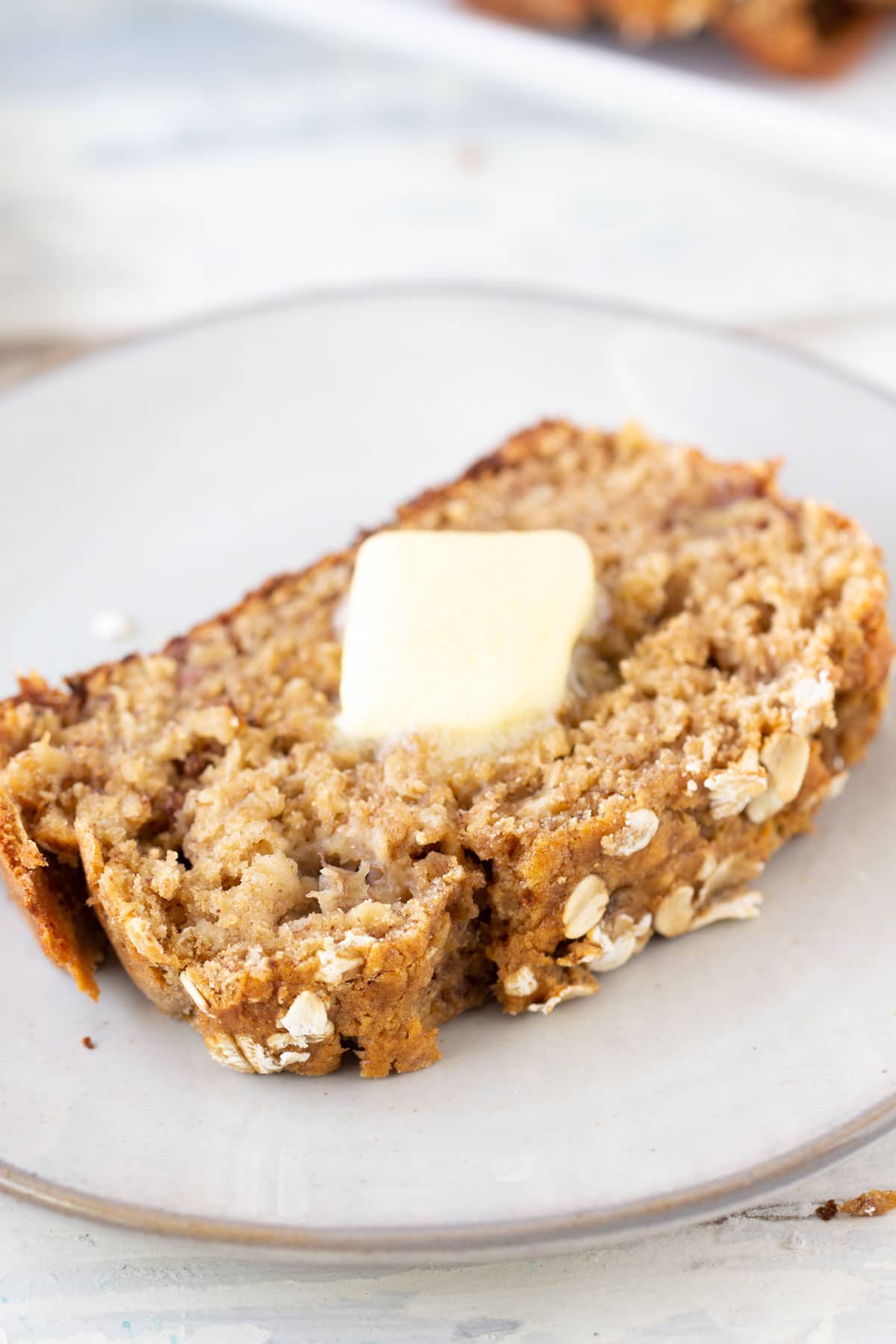 banana oatmeal bread with butter