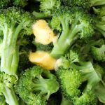 A quick and simple way to steam broccoli in the microwave in less than five minutes, add extra flavor, and you don't need plastic wrap!