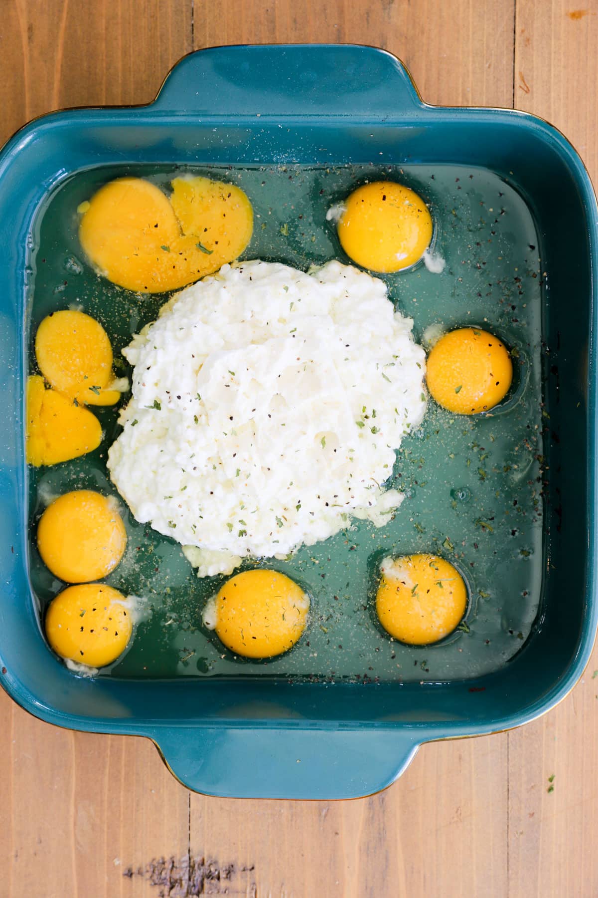 eggs and cottage cheese in baking dish before baking
